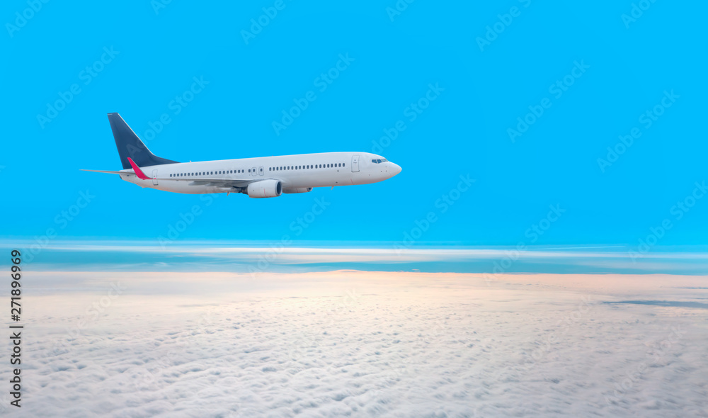 Passenger airplane in the clouds. travel by air transport Passenger airplane in the clouds. travel by air transport