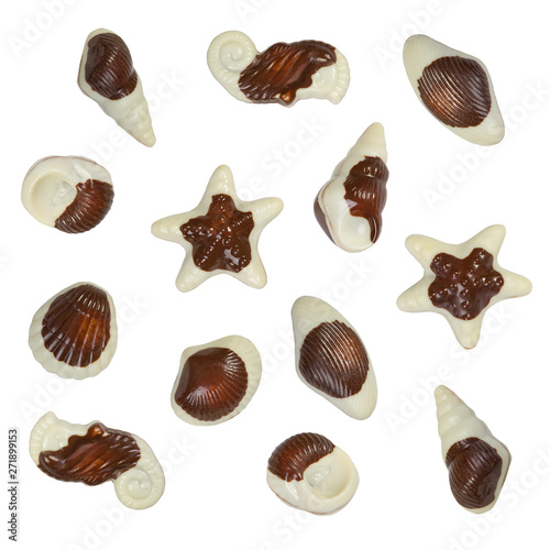 Figured chocolate sweets from white and dark chocolate isolated on white background