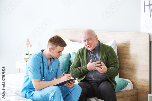 Medical worker with senior ...