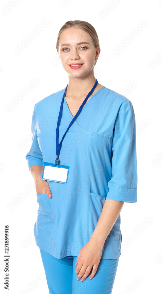 Young medical assistant on white background