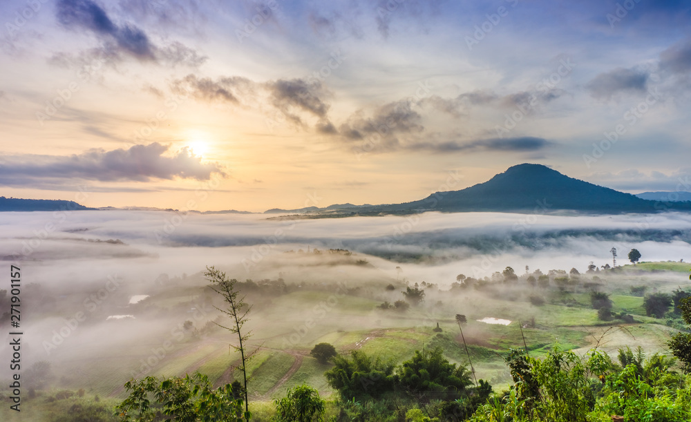 Obraz premium Scenery view of sunrise with mist and from Khao Ta-Khian Ngo Viewpoint. Location in Khao Kho District, Phetchabun, Thailand, Southeast Asia.