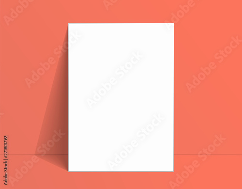 White poster mockup standing on the floor near Living coral color wall. Blank Canvas Mockup for design
