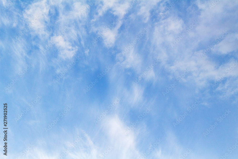 Blue sky with picturesque fluffy clouds background Blue sky with picturesque fluffy clouds background