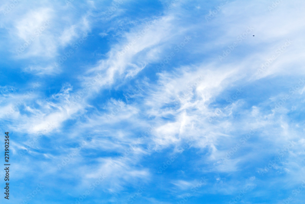 Fototapeta premium Blue sky with picturesque fluffy clouds background