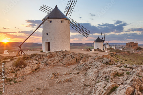 Traditional antique windmills at sunset in Spain. Consuegra, Toledo