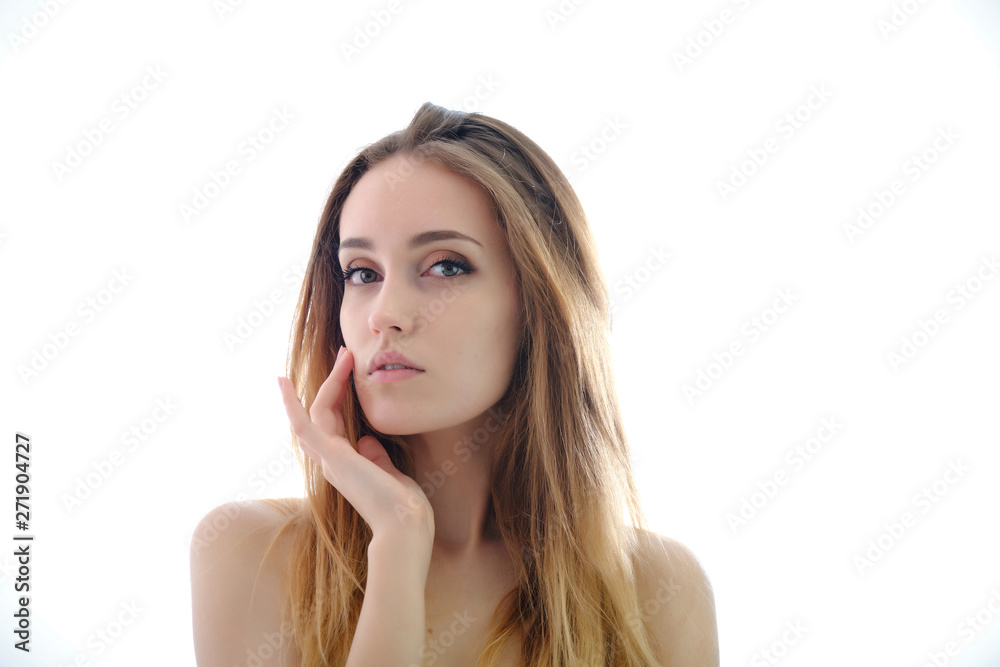 Photograph of a portrait of a beautiful fashionable beauty woman girl with long dark flowing hair, isolate on a white background. She is standing in different poses and smiling. Photograph of a portrait of a beautiful fashionable beauty woman girl with long dark flowing hair, isolate on a white background. She is standing in different poses and smiling.
