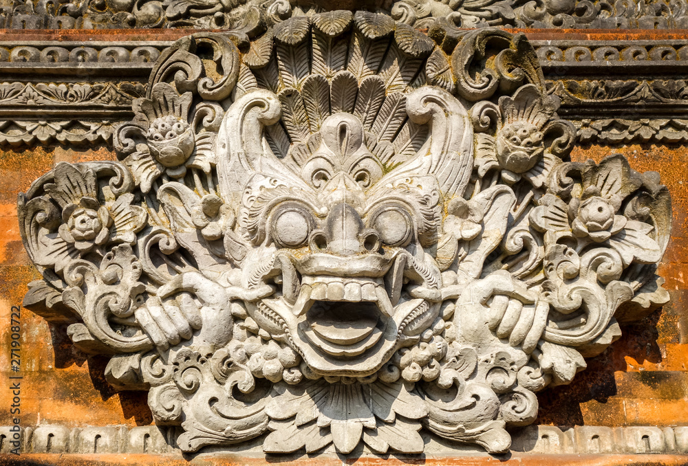 Statue on a temple entrance door, Ubud, Bali, Indonesia