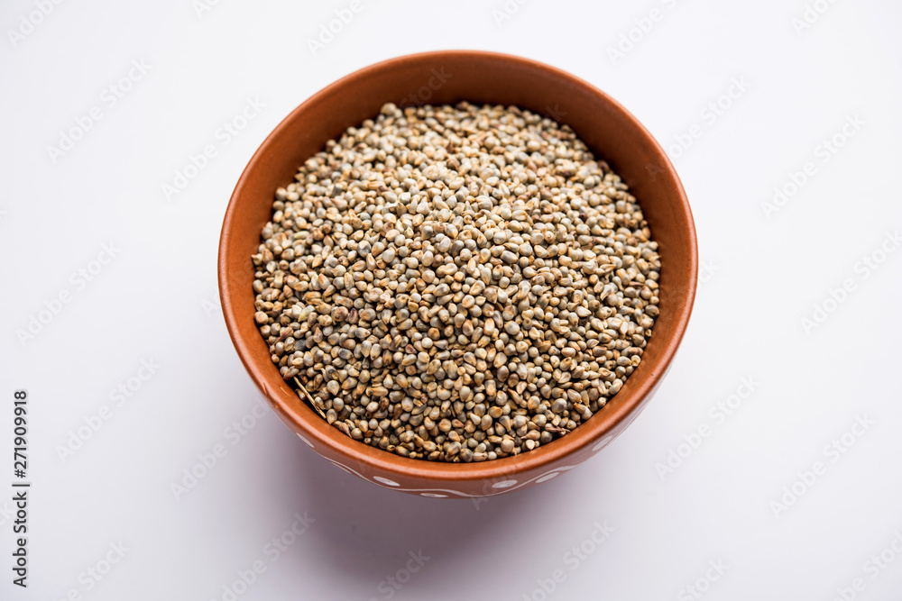 Pearl Millet or Bajra seeds also known as sorghum, in a bowl, selective focus Pearl Millet or Bajra seeds also known as sorghum, in a bowl, selective focus