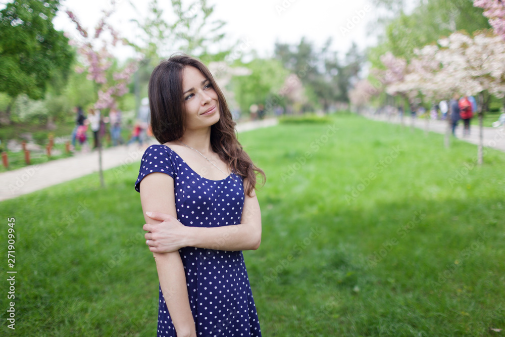 Young happy woman smiling enjoying spring day Young happy woman smiling enjoying spring day