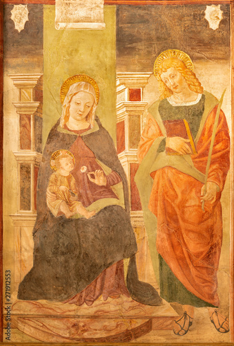 COMO, ITALY - MAY 11, 2015: The fresco of Madonna with the St. Ursula in church Chiesa di San Orsola by Andrea de’ Passeris (1496). photo