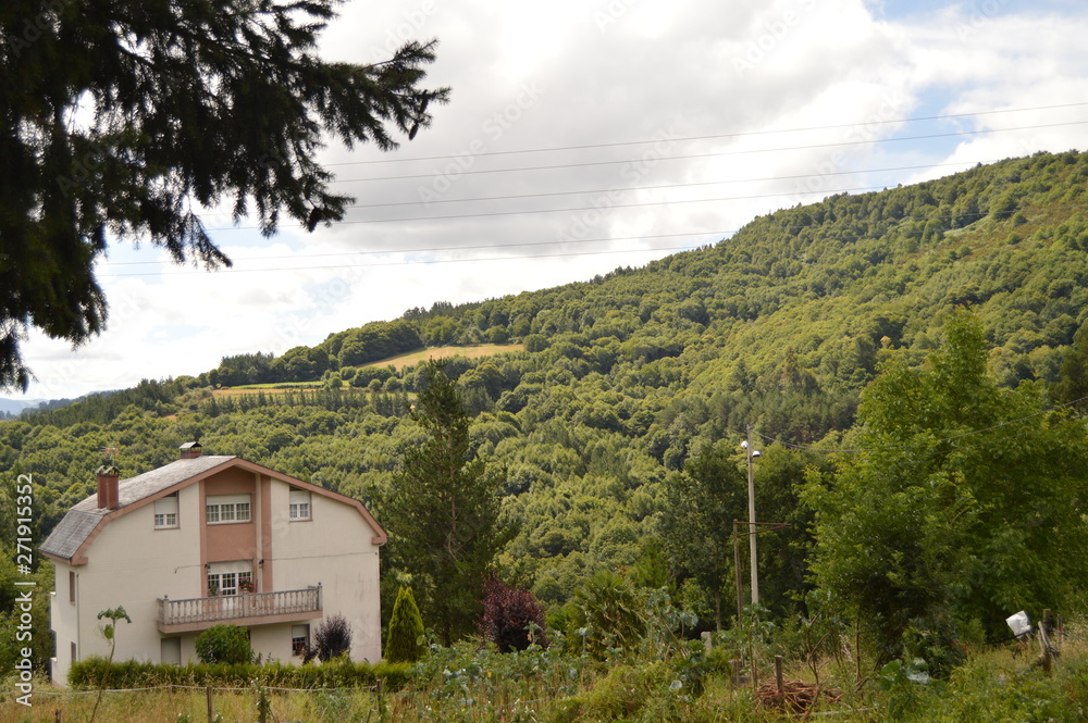 Beautiful House In The Magnificent Mountains Of Galicia Fills Valleys Pine Forests Meadows And Forests Of Eucalyptus In Becerrea. August 3, 2013. Becerrea, Lugo, Galicia, Spain. Rural Tourism, Nature. Beautiful House In The Magnificent Mountains Of Galicia Fills Valleys Pine Forests Meadows And Forests Of Eucalyptus In Becerrea. August 3, 2013. Becerrea, Lugo, Galicia, Spain. Rural Tourism, Nature.