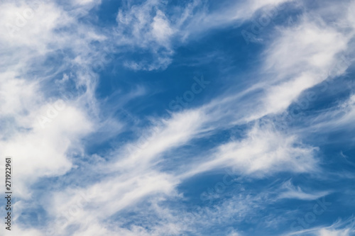 Unusual shape small fluffy clouds in the blue sky © berkut_34