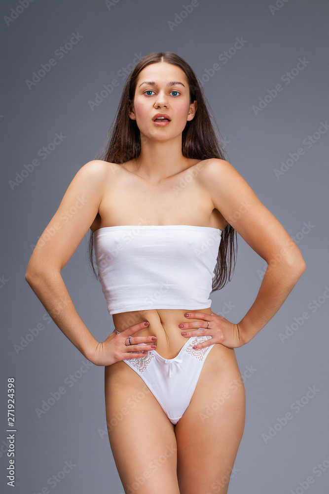 Sexy young woman in white underwear Stock Photo | Adobe Stock