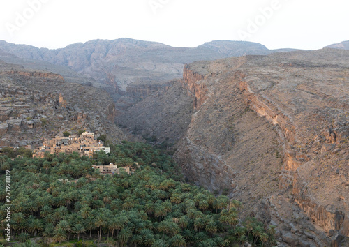 Old village in an oasis in front of the mountain, Ad Dakhiliyah Region, Misfat al Abriyyin, Oman photo