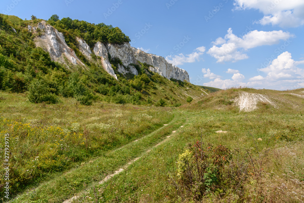 Country road at the foot of the chalk mountains in the Voronezh region, Russia. Village Storozhevoe.