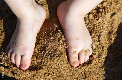 baby feet in the sand