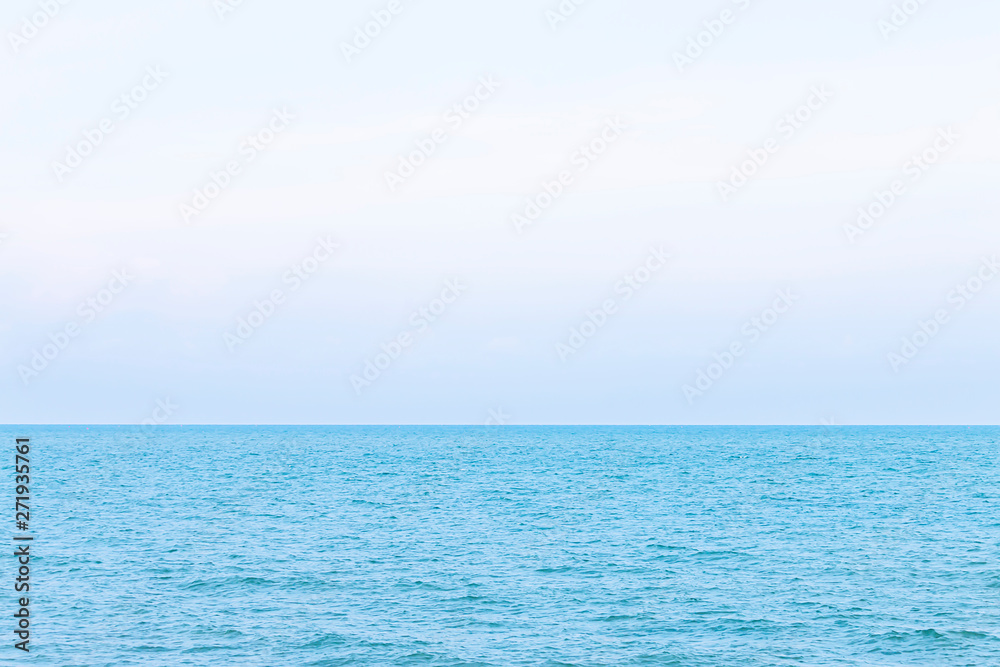 The sea and the sky that looks calm on a relaxing day.