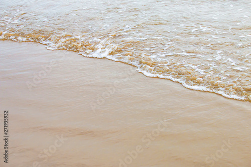 Fototapeta Naklejka Na Ścianę i Meble -  soft wave of the sea on the sandy beach.