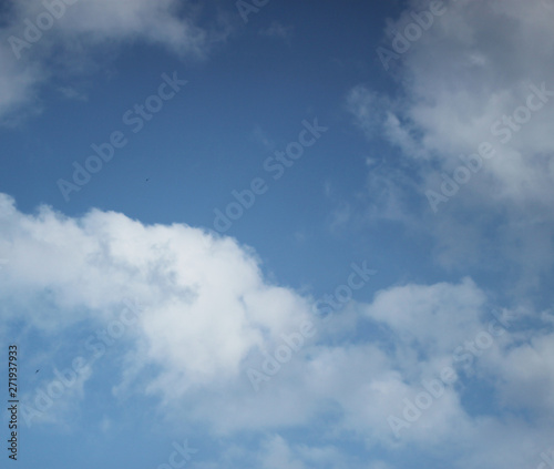 Sky abstract blue background with white clouds