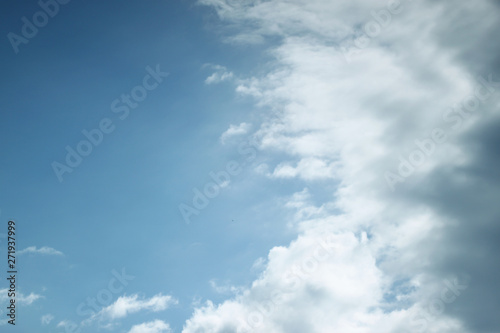 Sky blue background with clouds