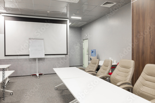 Minsk, Belarus - May 23, 2019: Interior of empty modern board room at creative office photo