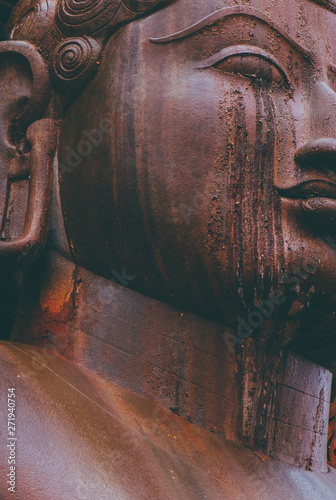 Shravanabelagola, Karnataka, India - 10th February 2017 - Devotes performing rituals to the statue of Bahubali at Shravanabelagola, Karnataka, India during mahamastakabhisheka photo