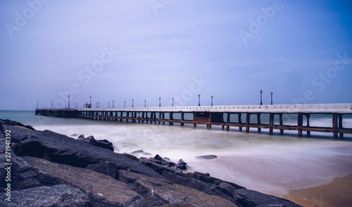 Old pier at Promenade Beach. Rock Beach is the popular stretch of beachfront in the city of Puducherry, India, along the Bay of Bengal photo