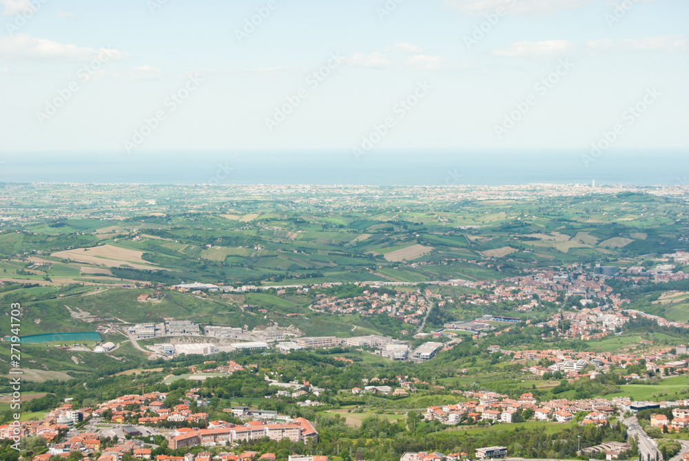 Landscape on green hilly till Adriatic sea seen from the top of San Marino