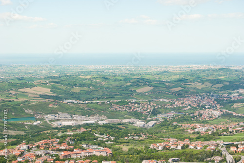 Landscape on green hilly till Adriatic sea seen from the top of San Marino