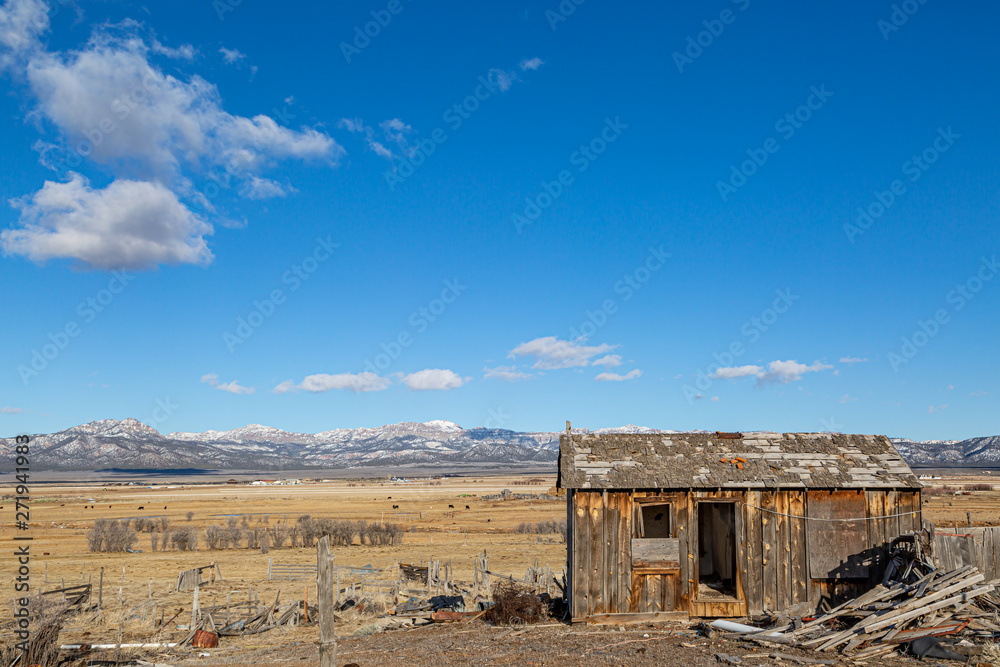 An old wooden shack in rural Utah, on a sunny winters day