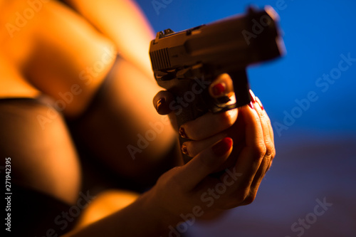 Busty lady killer gun stock photo. Image of agent, sensual - 122714864