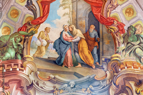 COMO, ITALY - MAY 8, 2015: The fresco of Visitation fresco in church Santuario del Santissimo Crocifisso by Gersam Turri (1927-1929). photo