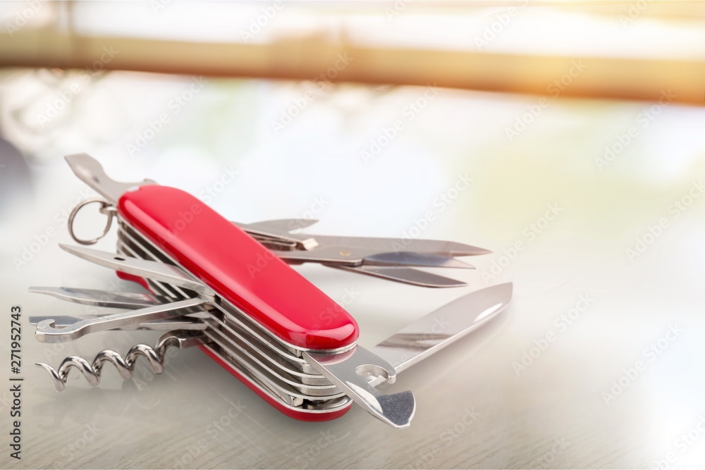 Multi-Tasking metal Penknife isolated on white Multi-Tasking metal Penknife isolated on white