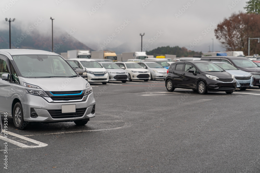 row of cars in parking