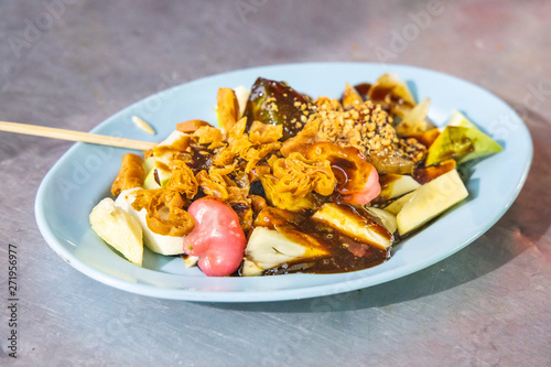 Canvas Print Popular Penang fruit rojak served with prawn paste and groundnuts
