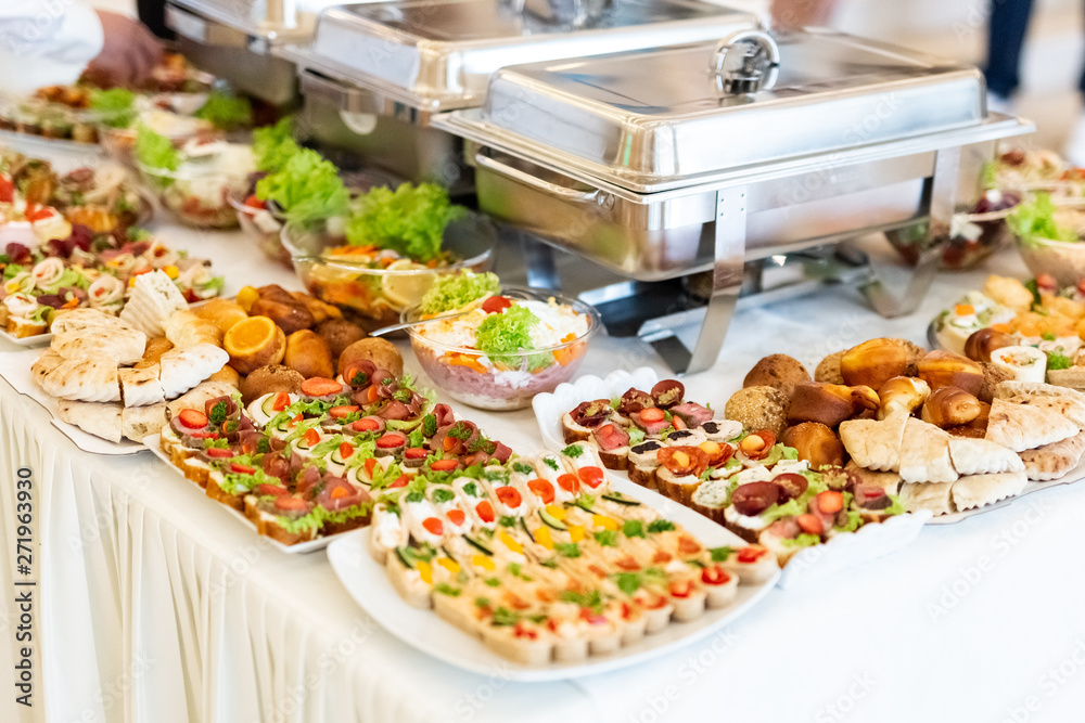 Fresh mediterranean canapes with fresh vegetable salads and baked products.