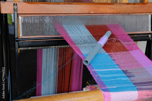 Obraz na płótnie weaving machine wooden loom for making textile