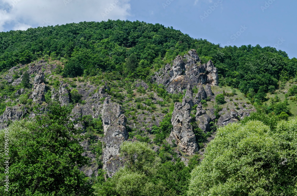 Large and well formed rocks resemble humans, beasts and other bizarre forms of peak Garvanets or raven is the most interesting natural landmark of Lozenska mountain, Bulgaria   