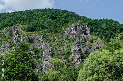 Large and well formed rocks resemble humans, beasts and other bizarre forms of peak Garvanets or raven is the most interesting natural landmark of Lozenska mountain, Bulgaria 