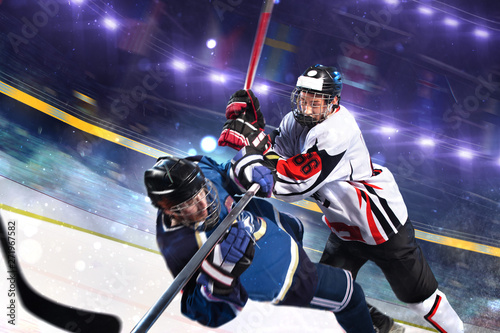 hockey player in action aggressive attack motion photo