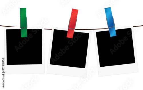 Wallpaper Mural Three blank polaroid frames hanging on a rope Torontodigital.ca