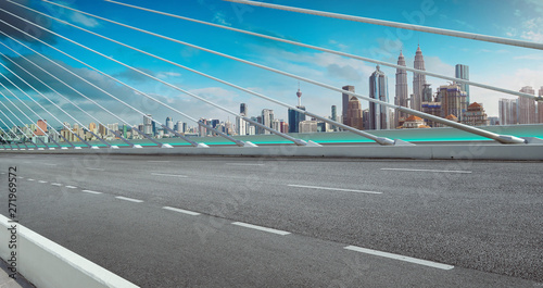 Canvas Print Modern cable-stayed bridge speedway with Kuala Lumpur cityscape