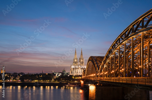 Cologne Dom with Hohenzollernbridge in afternoom photo