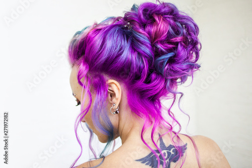 Delightfully bright colored hair, multi-colored coloring on long hair. An ele...