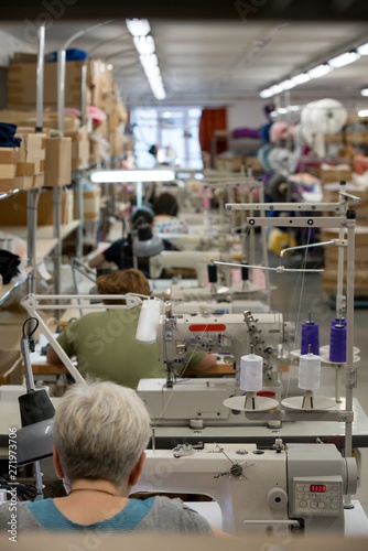 Women workers sewing in sewing workshop