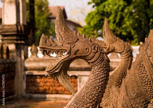 Dragons statues at vat sisaket, Vientiane, Laos photo