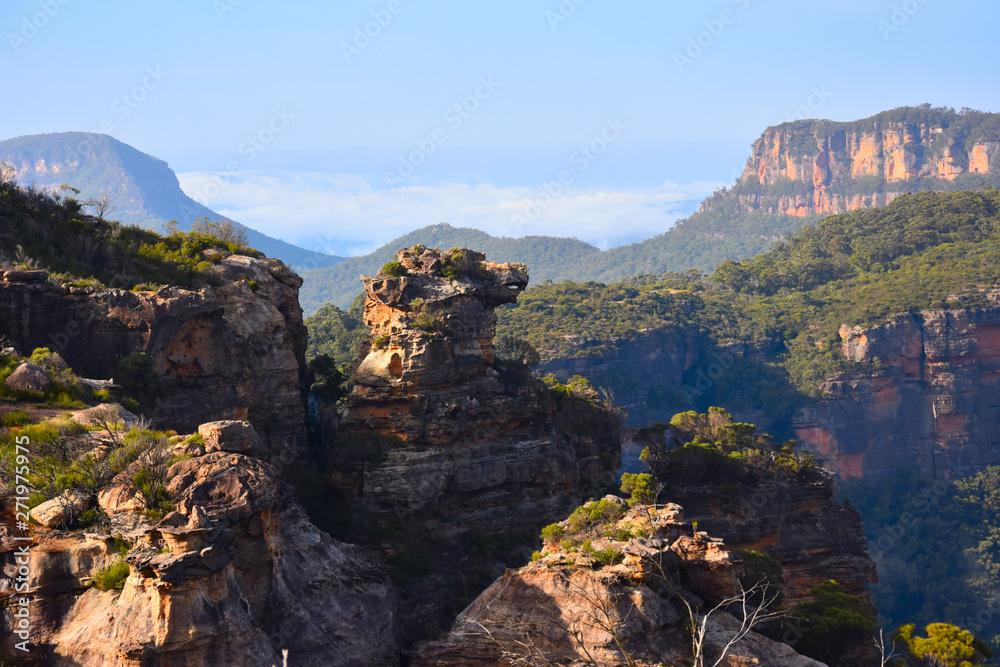 Scenic views of Narrowneck plateau which divides the Jamison and Megalong valleys in the Blue Mountains, Australia. In the foreground a rocky cliff known as Boars Head.