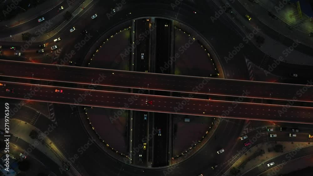Aerial view Expressway motorway highway circus intersection at Night time Top view , Road traffic in city at thailand.