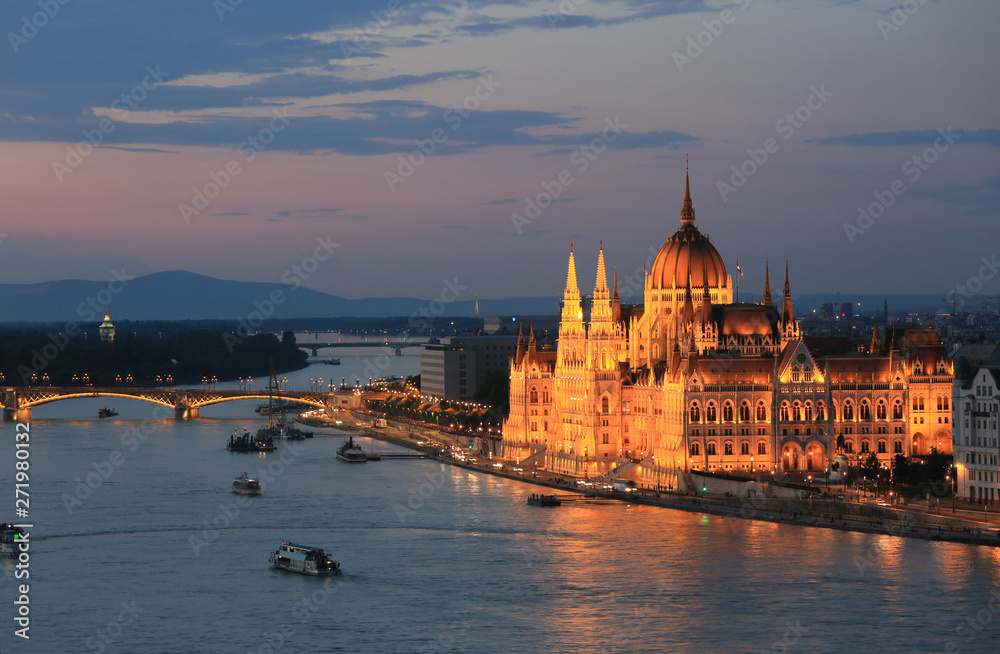 Beautiful evening view of the Danube River and the Hungarian Parliament Building in Budapest