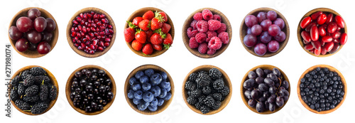 Red and black-blue food. Collage of different fruits and berries at green and red color. Top view. 